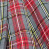 Skirt checkered with metallic buttons (4-14 years)