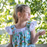 Dress with tropical pattern and ruffles (6-14 years)